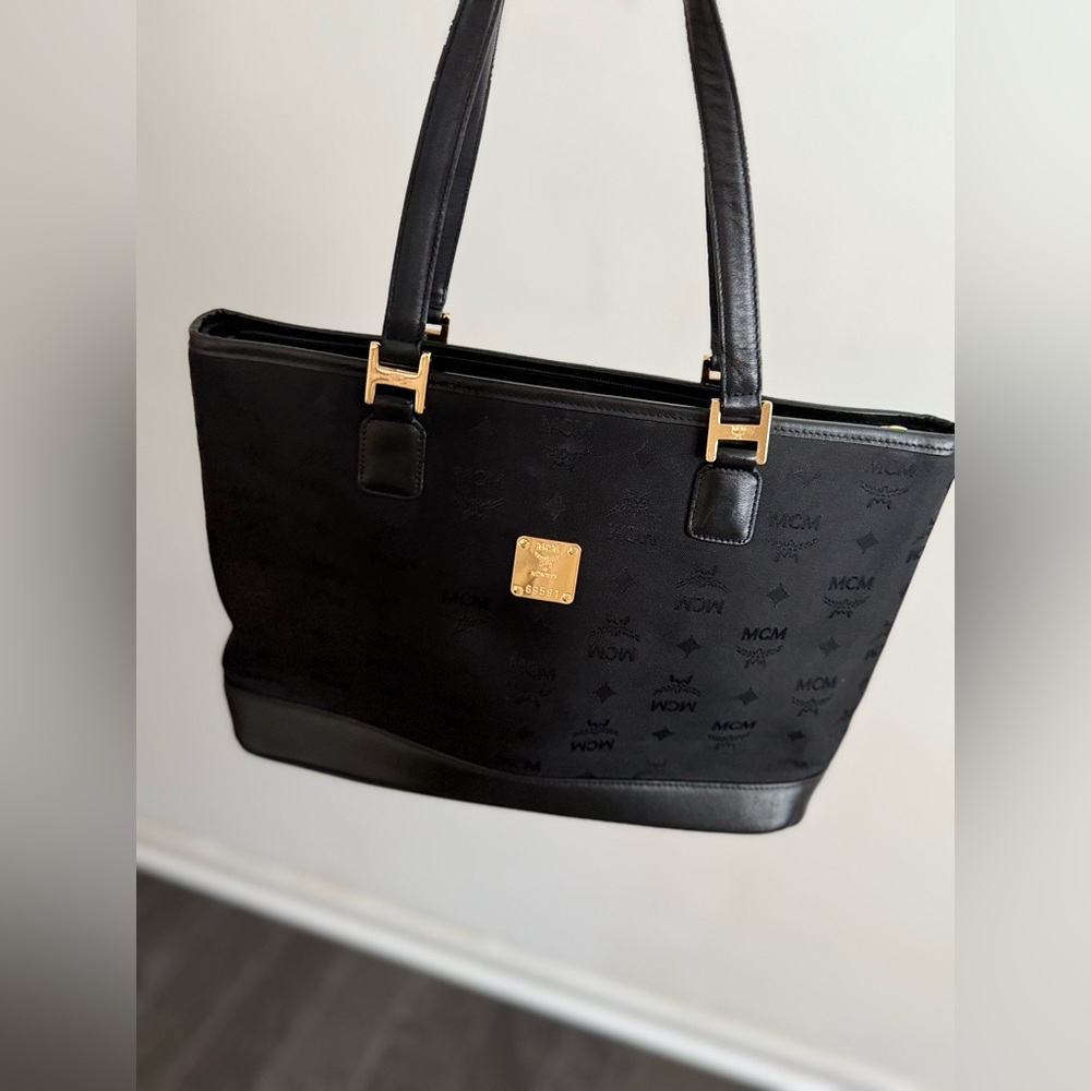 MCM Black Shoulder Bag with Gold Accents